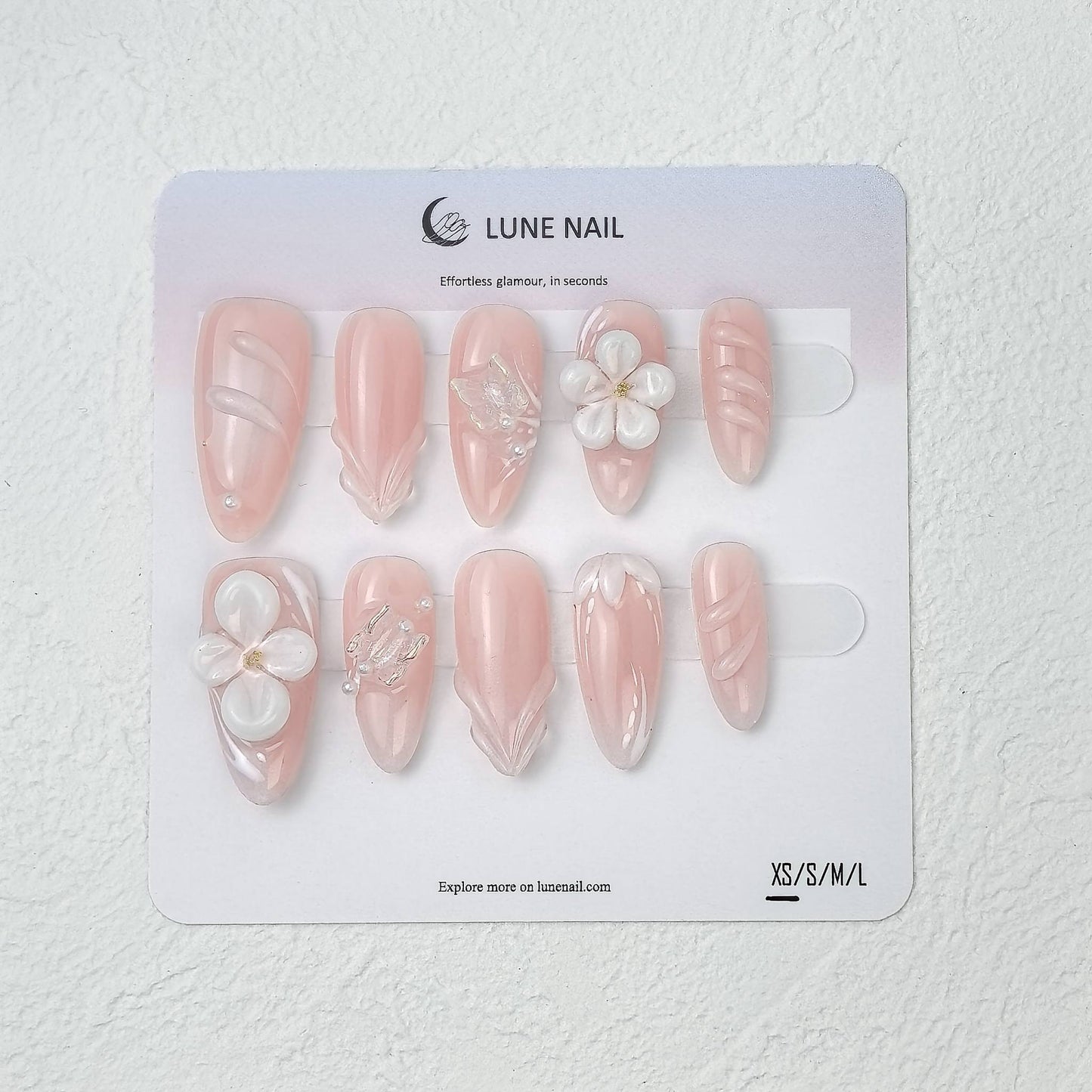 LUNE NAIL branded card showing pink floral press-on nail set