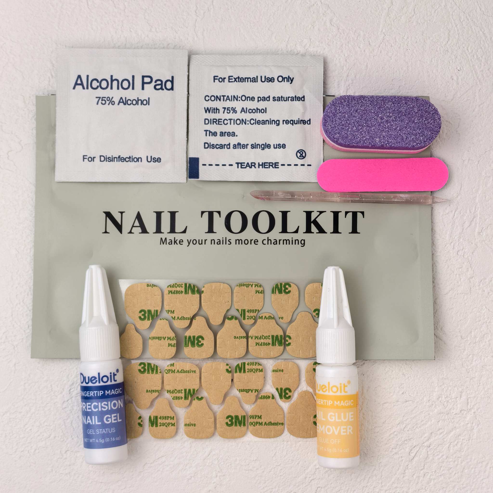 Nail prep kit with glue, tabs, remover, file, and alcohol pads